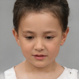 Joyful white child female with short  brown hair and brown eyes