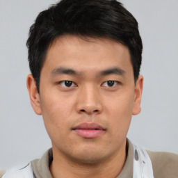 Neutral asian young-adult male with short  brown hair and brown eyes