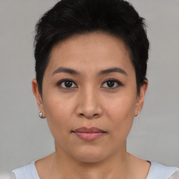 Neutral asian young-adult female with short  black hair and brown eyes