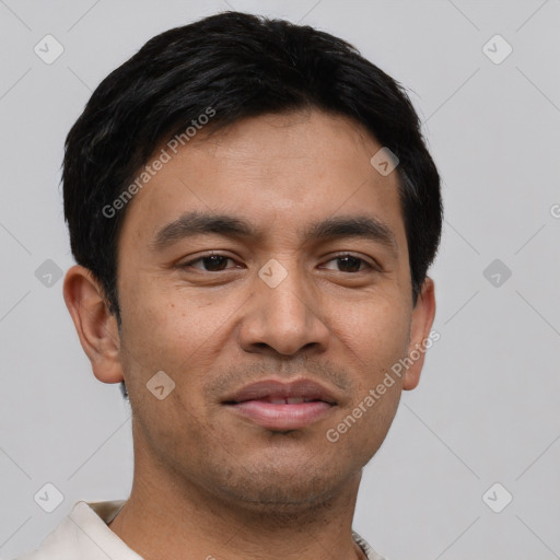 Joyful asian young-adult male with short  black hair and brown eyes