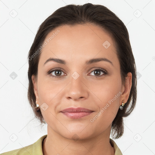 Joyful white young-adult female with medium  brown hair and brown eyes