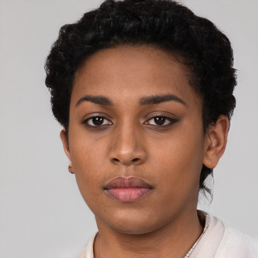 Neutral latino young-adult female with short  black hair and brown eyes