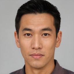 Neutral asian young-adult male with short  black hair and brown eyes