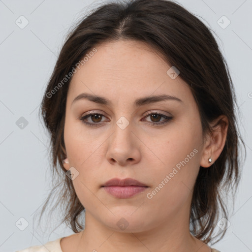 Neutral white young-adult female with medium  brown hair and brown eyes