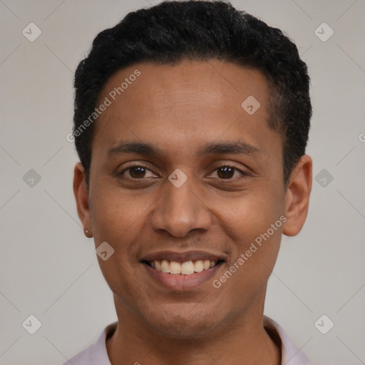 Joyful latino young-adult male with short  black hair and brown eyes