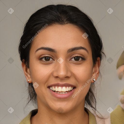 Joyful latino young-adult female with medium  brown hair and brown eyes