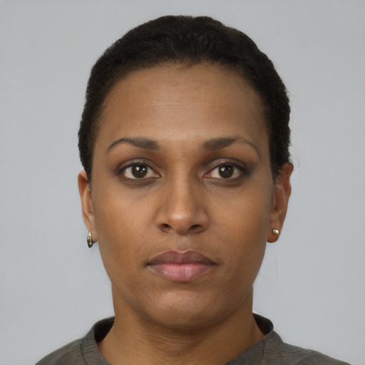 Neutral black young-adult female with short  black hair and brown eyes