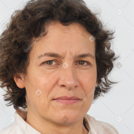 Joyful white adult male with medium  brown hair and brown eyes