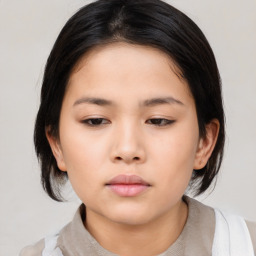 Neutral asian young-adult female with medium  brown hair and brown eyes