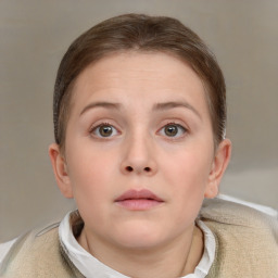 Neutral white child female with short  brown hair and brown eyes