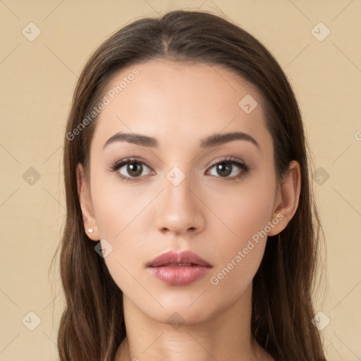 Neutral white young-adult female with long  brown hair and brown eyes