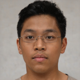 Neutral asian young-adult male with short  brown hair and brown eyes