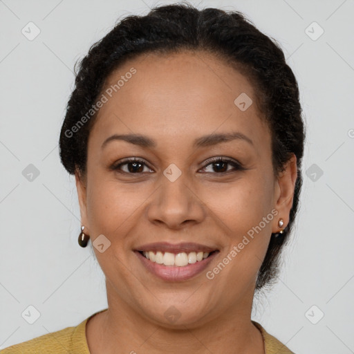 Joyful latino young-adult female with short  brown hair and brown eyes