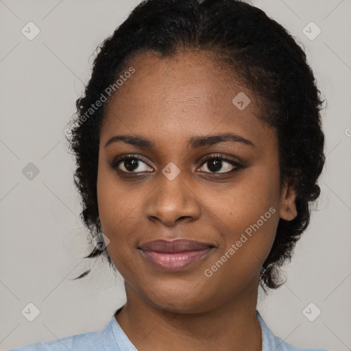 Joyful black young-adult female with medium  black hair and brown eyes