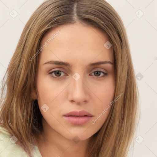 Neutral white young-adult female with long  brown hair and brown eyes