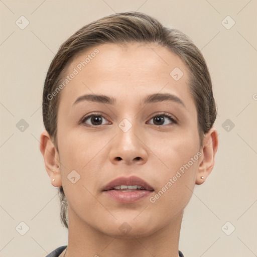 Neutral white young-adult female with short  brown hair and brown eyes