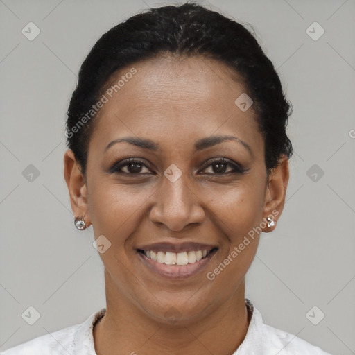 Joyful latino young-adult female with short  brown hair and brown eyes