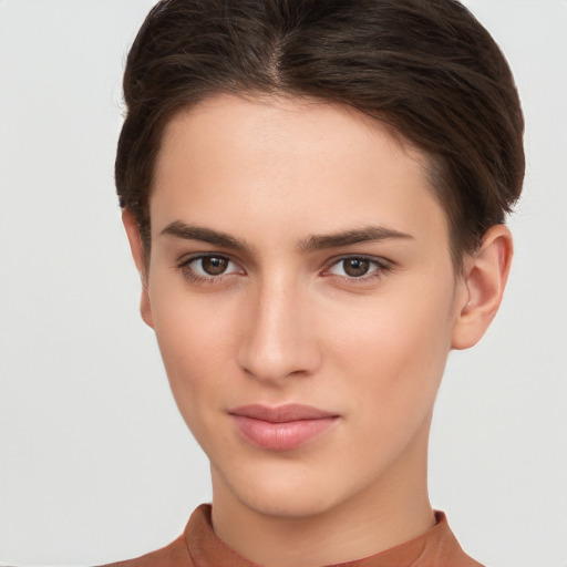 Neutral white young-adult female with short  brown hair and brown eyes