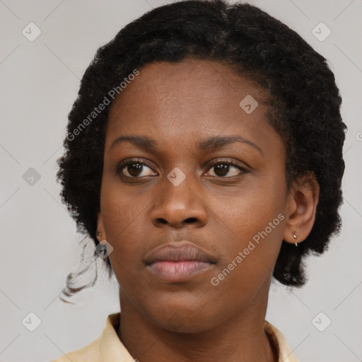 Neutral black young-adult female with short  brown hair and brown eyes