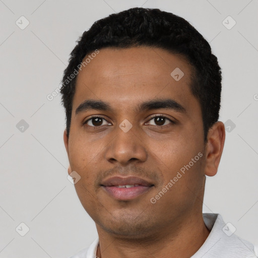 Neutral latino young-adult male with short  black hair and brown eyes
