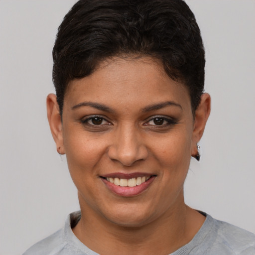 Joyful white young-adult female with short  brown hair and brown eyes