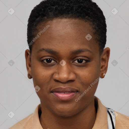 Joyful black young-adult female with short  brown hair and brown eyes