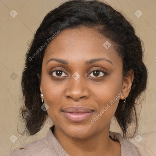 Joyful black young-adult female with medium  brown hair and brown eyes