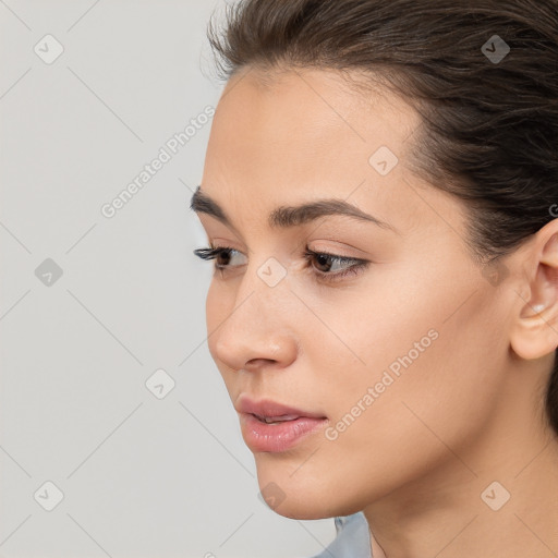 Neutral white young-adult female with medium  brown hair and brown eyes