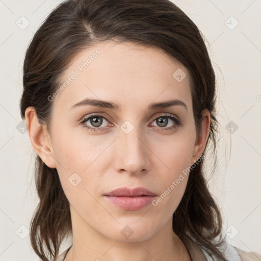 Neutral white young-adult female with medium  brown hair and brown eyes