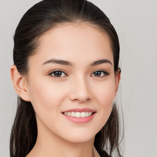 Joyful white young-adult female with long  brown hair and brown eyes