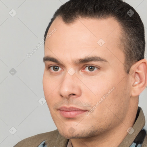 Neutral white young-adult male with short  brown hair and brown eyes