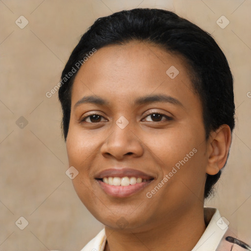 Joyful black young-adult female with medium  black hair and brown eyes