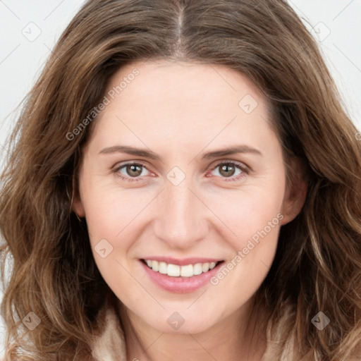 Joyful white young-adult female with long  brown hair and green eyes