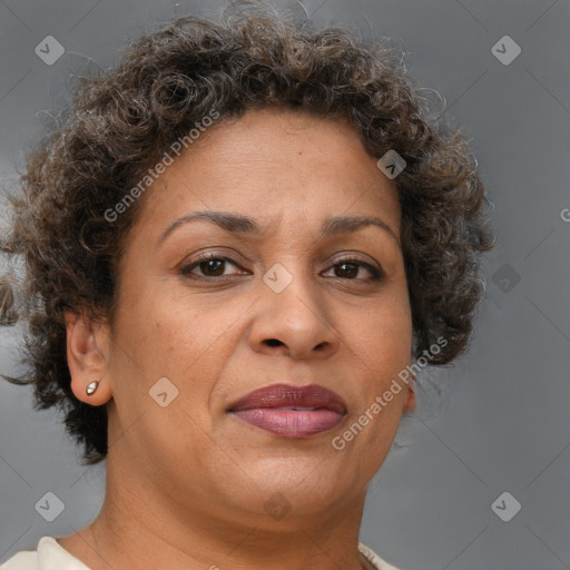 Joyful white adult female with short  brown hair and brown eyes