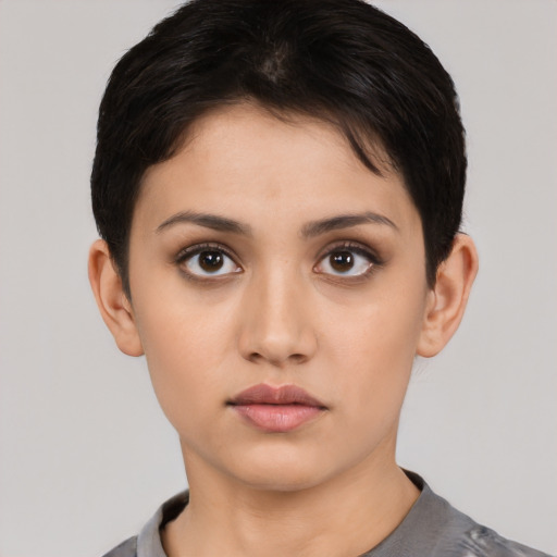 Neutral white young-adult female with short  black hair and brown eyes