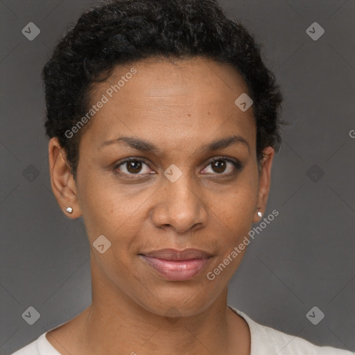 Joyful black adult female with short  brown hair and brown eyes