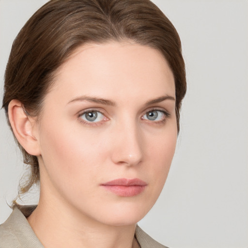 Neutral white young-adult female with medium  brown hair and grey eyes