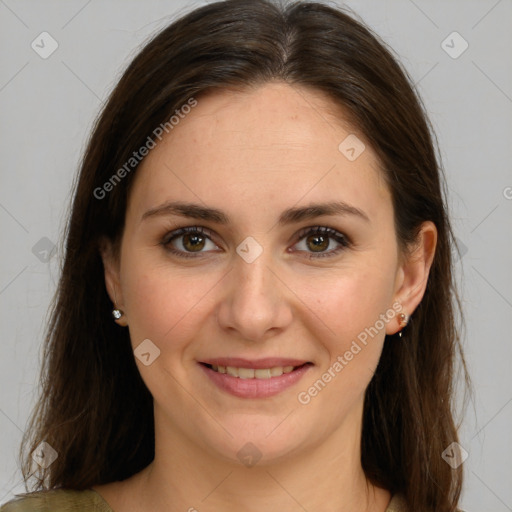 Joyful white young-adult female with long  brown hair and brown eyes