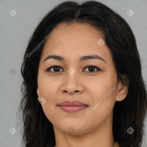 Joyful asian young-adult female with long  brown hair and brown eyes