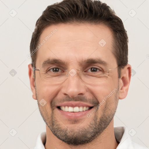 Joyful white adult male with short  brown hair and brown eyes