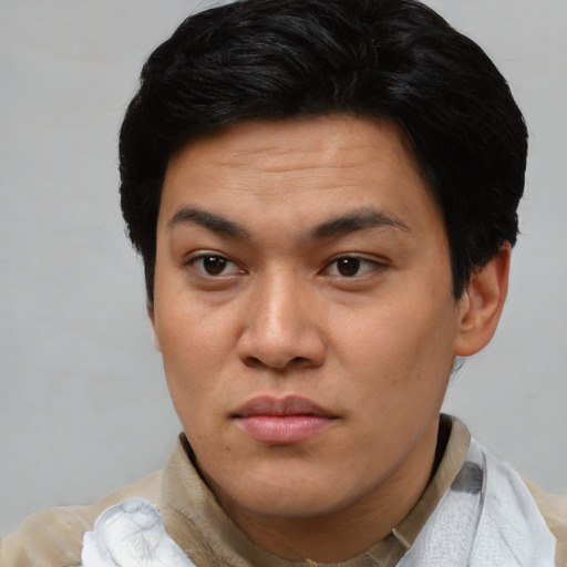 Neutral latino young-adult male with short  brown hair and brown eyes