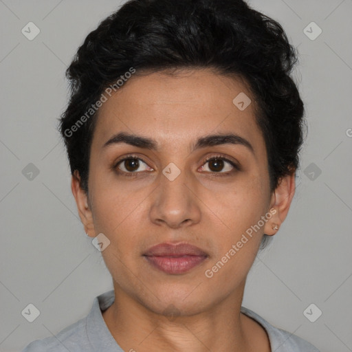 Joyful latino young-adult female with short  black hair and brown eyes