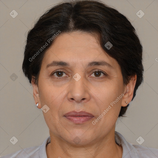 Joyful white adult female with short  brown hair and brown eyes