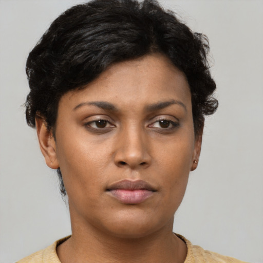 Neutral latino young-adult female with short  brown hair and brown eyes