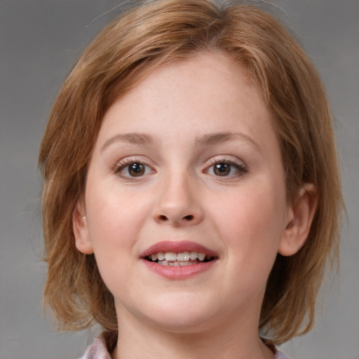 Joyful white young-adult female with medium  brown hair and blue eyes