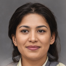 Joyful asian young-adult female with medium  brown hair and brown eyes