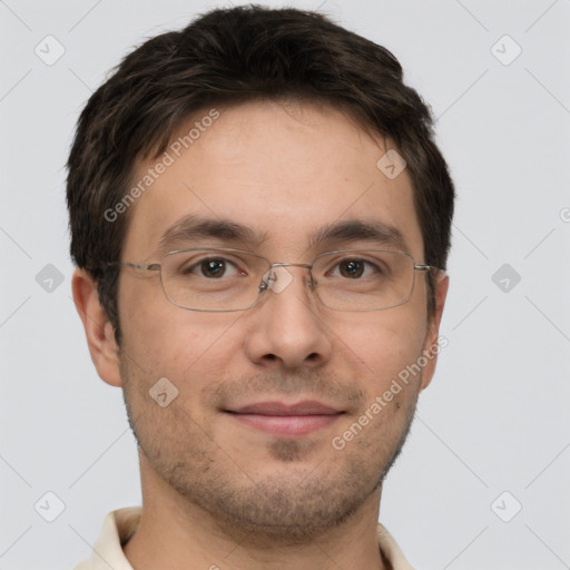 Joyful white adult male with short  brown hair and brown eyes