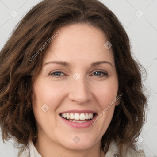 Joyful white young-adult female with medium  brown hair and green eyes