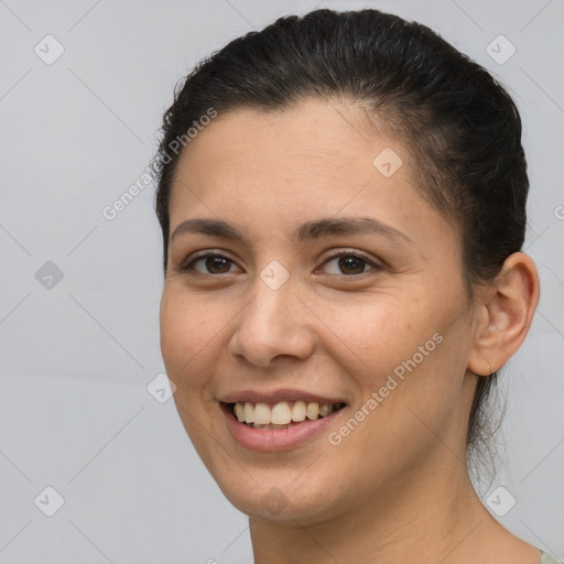 Joyful white young-adult female with short  brown hair and brown eyes