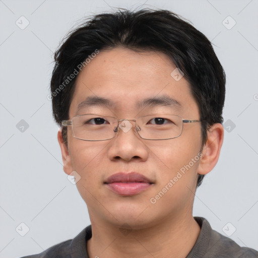 Neutral asian young-adult male with short  brown hair and brown eyes